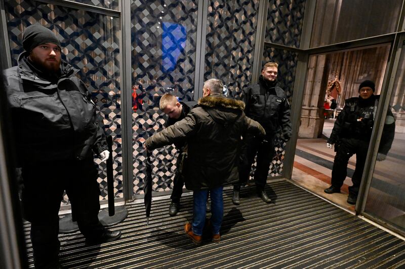 Churchgoers were searched at the entrance of Cologne Cathedral (dpa via AP)
