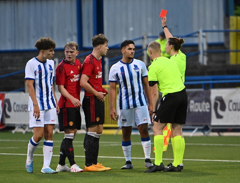 Manchester United were defeated 2-1 by German outfit Hertha Berlin, in an action-packed game which also saw two missed first half penalties and two straight red cards in the dying embers of the clash at the Coleraine Showgrounds.