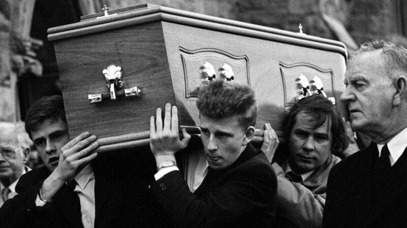 TV personality Patrick Kielty (centre) carries his fathers coffin at the funeral in 1988 