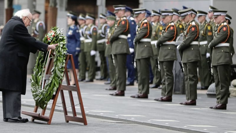 President Michael D Higgins lays a wreath during a ceremony to mark the anniversary of the 1916 Easter Rising at the GPO on O&#39;Connell Street in Dublin Picture by Niall Carson/PA 