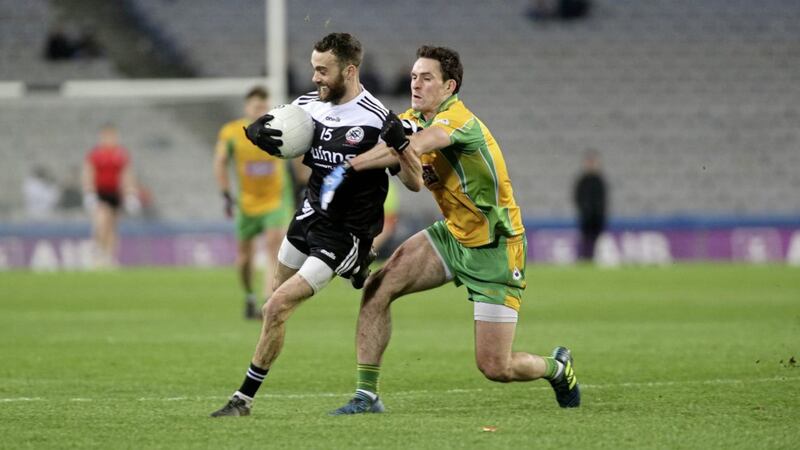 Conor Laverty scored a late point as Kilcoo forced extra-time yesterday. Picture Seamus Loughran. 