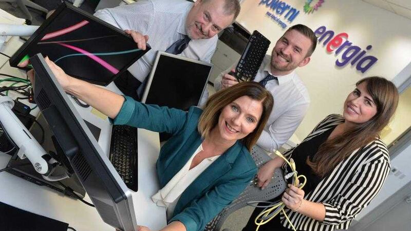 Viridian Group CIO Catherine Gardiner (seated) with (from left) Paul Comins (project manager), Sean McCrea (technical lead) and Orlaith Murtagh (business analyst). Photo: Aaron McCracken/Harrisons 