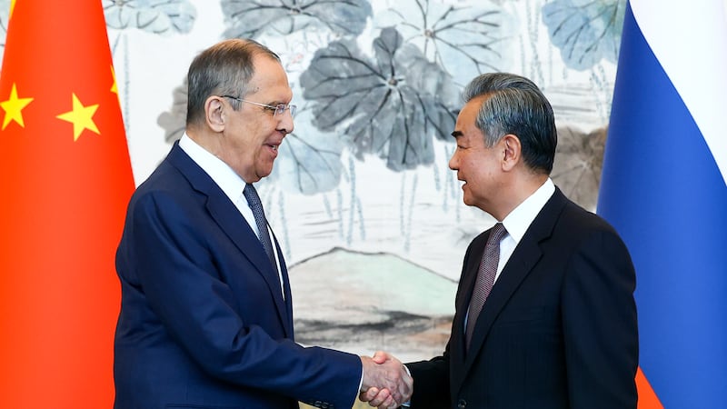 Russian Foreign Minister Sergey Lavrov and Chinese Foreign Minister Wang Yi (Russian Foreign Ministry Press Service via AP)