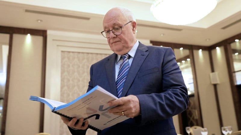 Sir Michael Lyons, chair of the independent review of Invest Northern Ireland, holds a copy of the report at the Dunadry Hotel, Antrim. Picture by Peter Morrison 