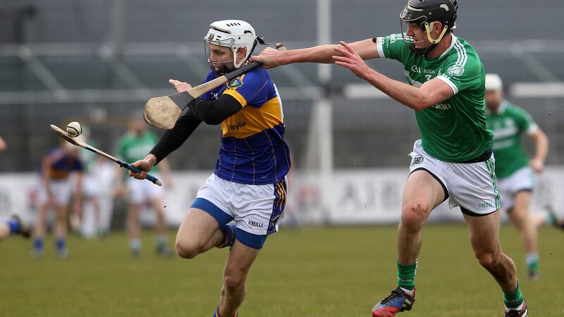 Portaferry's Eoghan Sands, left, contributed 1-3 to last year's Ulster final success against Cushendall