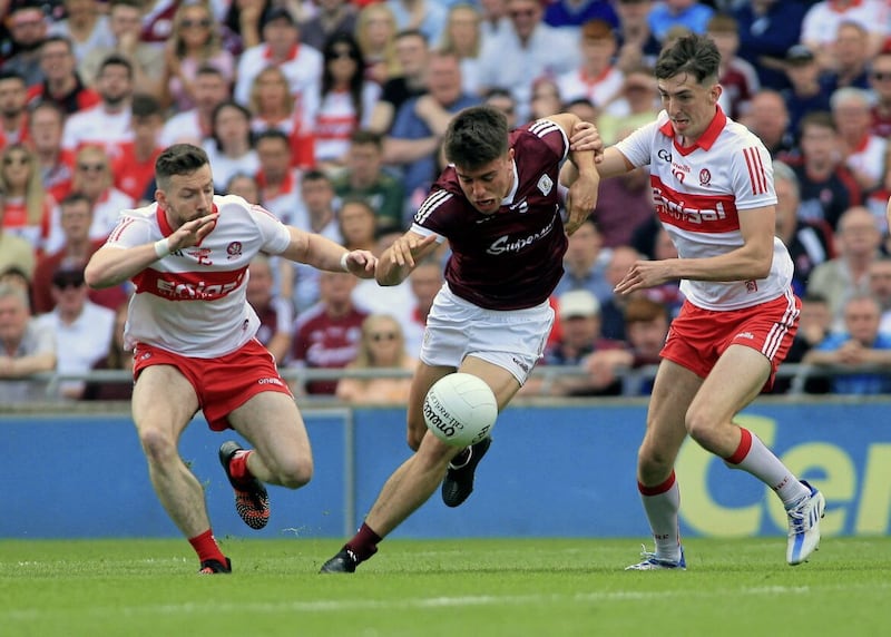 Bellaghy man Paul Cassidy (right) up against Galway captain Sean Kelly in the 2022 All-Ireland SFC semi-final. Picture Seamus Loughran 