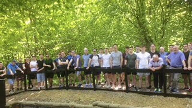 Members of the Dublin senior football team visiting the Ulster Tower memorial in France. 