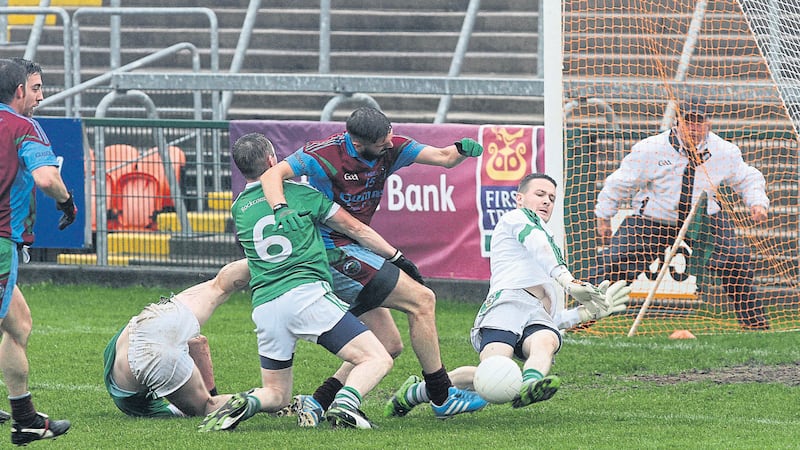 TAKEN DOWN: Glasdrumman&rsquo;s Connaire Harrison is fouled by Rockcorry&rsquo;s Keith Daly at the Athletic Grounds yesterday, resulting in a late penalty for the Down side, which was saved by keeper Jamie Smith; (below) Fergal McGeough of Rockcorry is tackled by Glasdrumman&rsquo;s Shane Harrison								<span class="Apple-tab-span" style="white-space: pre;">		</span>&nbsp; &nbsp; &nbsp; &nbsp;&nbsp;