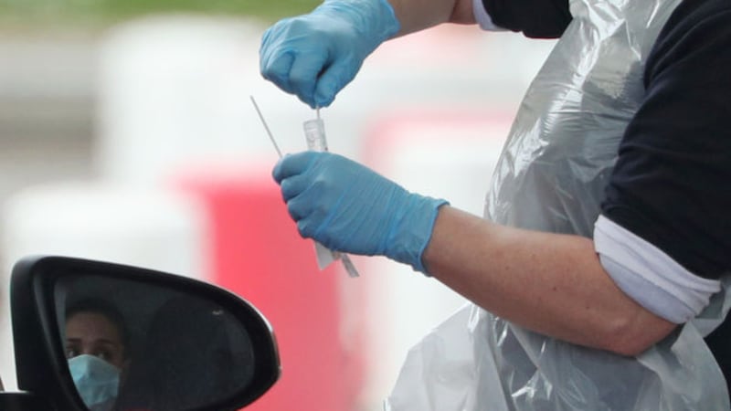 A person is tested at a drive through coronavirus testing site in a car park at Chessington World of Adventures, in Greater London, as the UK continues in lockdown to help curb the spread of the coronavirus.<br />Picture by Yui Mok/PA Wire&nbsp;