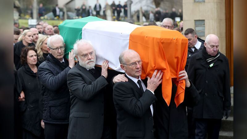 &nbsp;The coffin of Martin McGuinness is carried into St Columba's Church Long Tower, for his funeral Mass. Picture by Niall Carson, PA