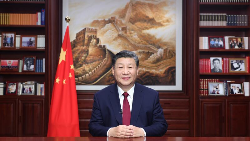 Chinese President Xi Jinping said in his televised New Year address that China will ‘surely be reunified’ with Taiwan (Ju Peng/Xinhua/AP)