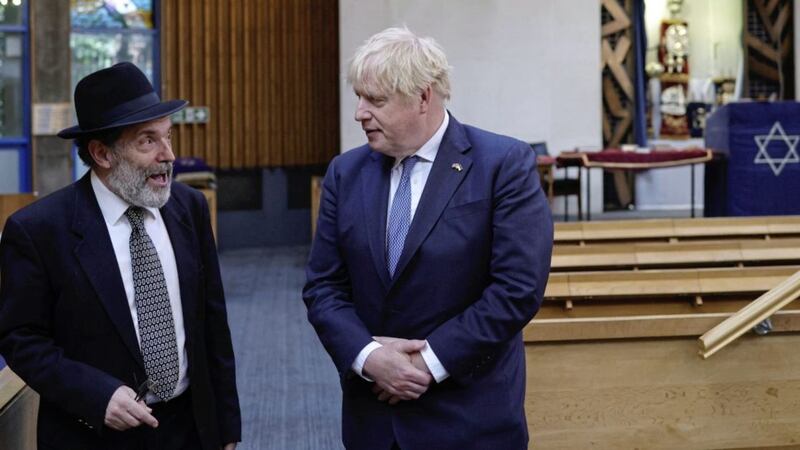 The Reverend David Kale (left) with Boris Johnson at the Belfast Jewish Community Synagogue on Monday 