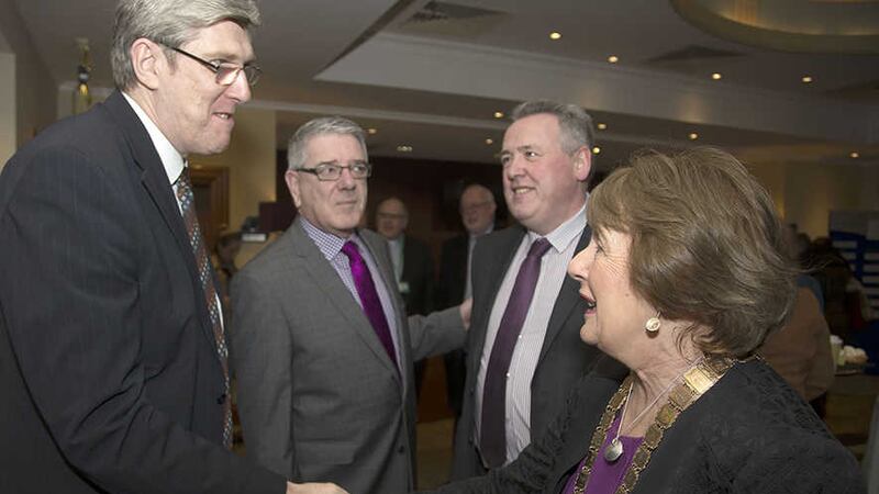 Education Minister John O'Dowd (left) is attending the INTO Northern Congress&nbsp;