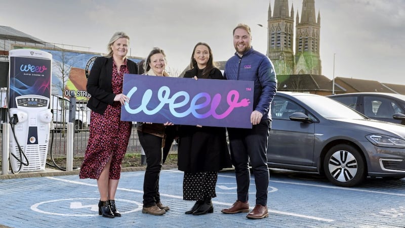 Officially opening the new rapid electric vehicle (EV) charging hub at the Twin Spires Complex in Belfast are (from left) Ciara Campbell (Weev), Rachel Reid (EV Association NI) and Bronagh McKernan and Noel Rooney of Ortus Property Services, which operates the complex. Picture: Darren Kidd/PressEye   