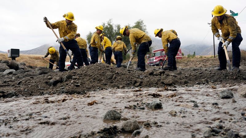 Crews worked to dig roads, buildings and care home residents out of the mud across a wide swathe of south-western US desert as the first tropical storm to hit Southern California in 84 years headed north (Marcio Jose Sanchez/AP)