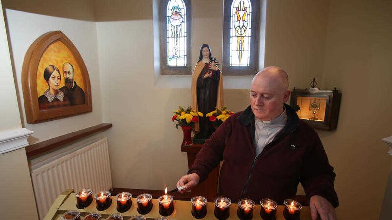 Fr Patrick McCafferty prepares for the feast of St Th&eacute;r&egrave;se of Lisieux. A new shrine will be dedicated in Crossgar today. Picture by Mal McCann 
