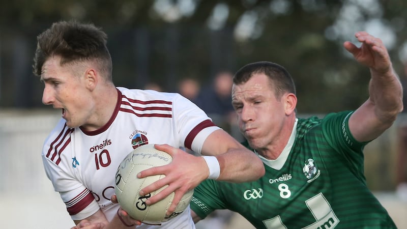 Slaughtneil’s Peter McCullagh with Michael Bateson of Newbridge during the Derry Senior Football Championship match played at Owenbeg                    Picture: Margaret McLaughlin