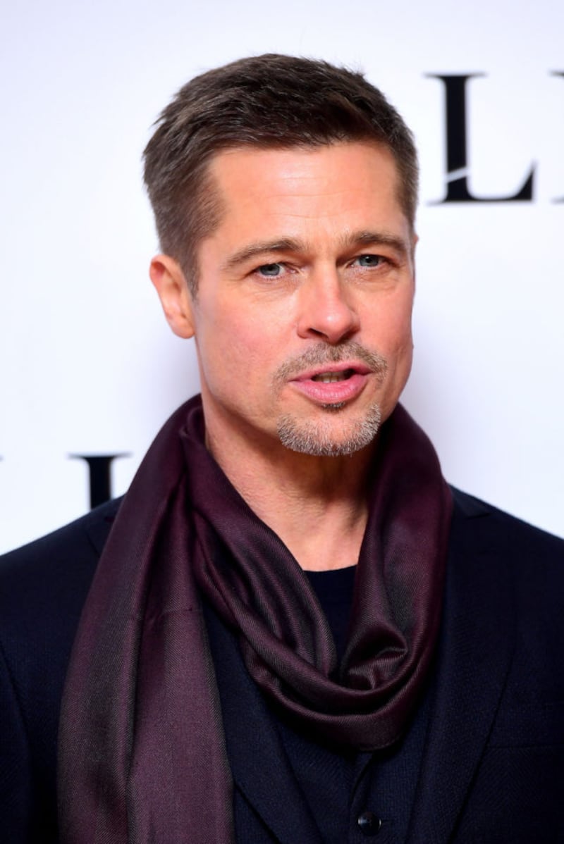 Actor Brad Pitt joined Tilda Swinton on stage (Ian West/PA).