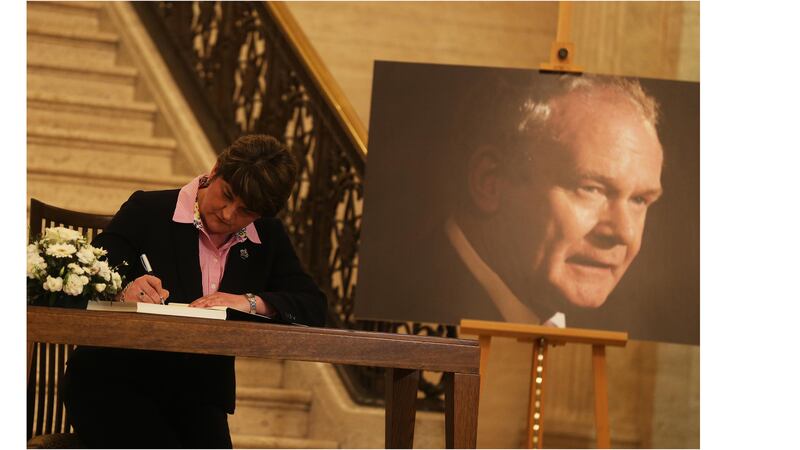 &nbsp;Arlene Foster signs the book of condolences at Stormont for Martin McGuinness