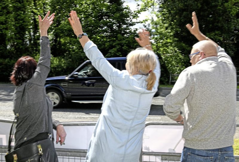 SAVIA supporters try to grab the attention of the Royals as they arrive at Castlecoole. Picture by Alan Lewis/Photopress