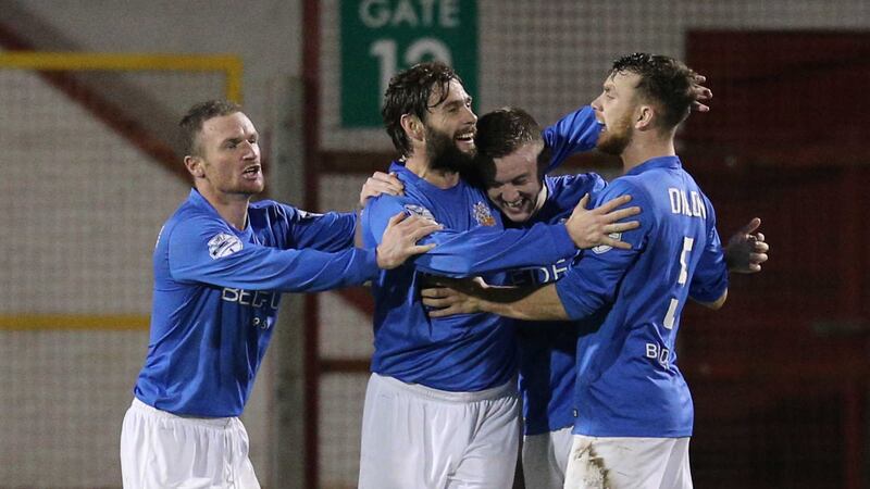 Glenavon's James Singleton celebrates with his team-mates after scoring the equaliser against Portadown at Shamrock Park on Tuesday<br />Picture: Pacemaker&nbsp;