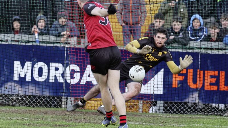 Odhran Lynch saves Rory Mason&#39;s penalty during the shootout. Picture by Hugh Russell 