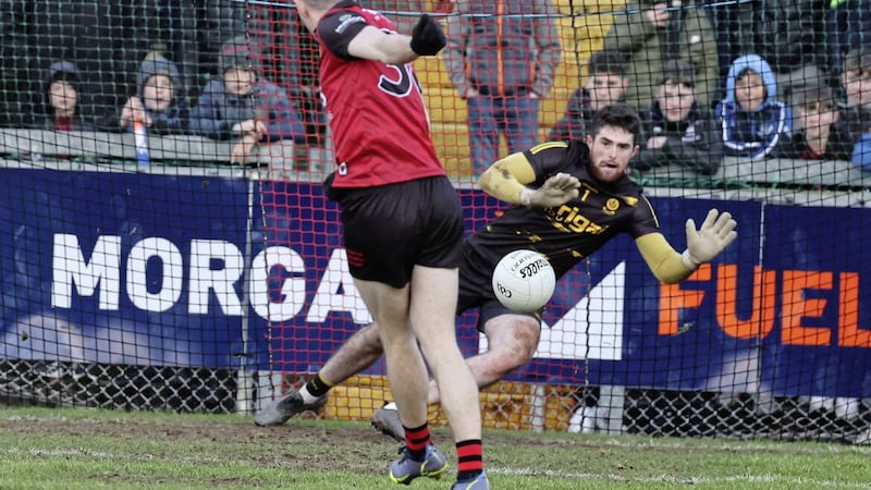 Odhran Lynch saves Rory Mason&#39;s penalty during the shootout. Picture by Hugh Russell 
