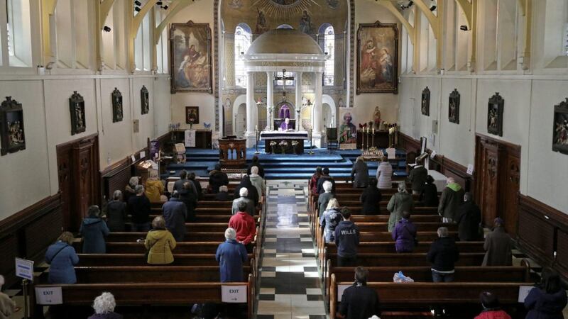 Mass at St Mary&#39;s Church in Belfast city centre as Catholic churches in the north re-opened their doors. Picture by Hugh Russell 