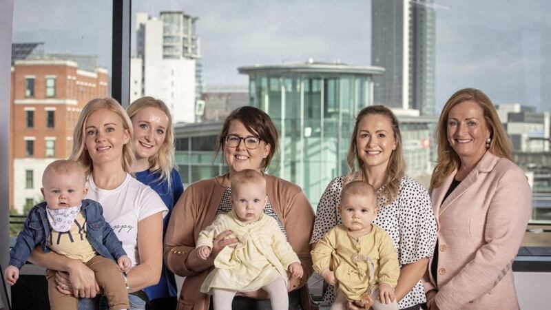 Fiona McGarrigle (Deloitte) and her baby Rossagh Hughes, Nicky Scott from WIB, Donna Brewer (Baker McKenzie) and her baby Holly Hodgson, Stephanie Kennedy (NIE Networks) and her baby Ella Kennedy, and coach Una McSorley at the launch of WIB&#39;s new centre of learning 