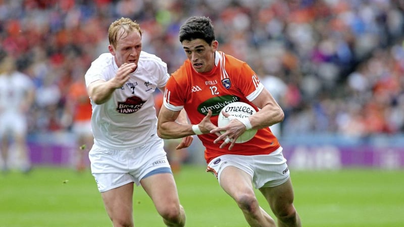 Armagh&#39;s Rory Grugan and Keith Cribbin of Kildare in action at Croke Park. Picture: Seamus Loughran. 