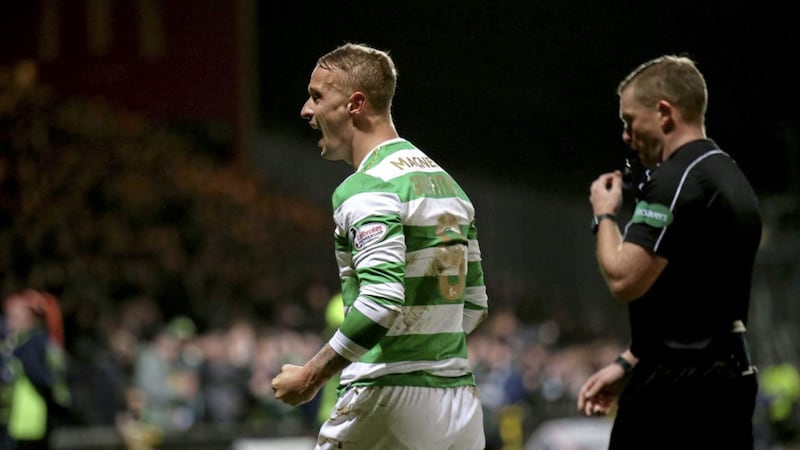Celtic&#39;s match-winner Leigh Griffiths celebrates after the final whistle of the win over Partick 