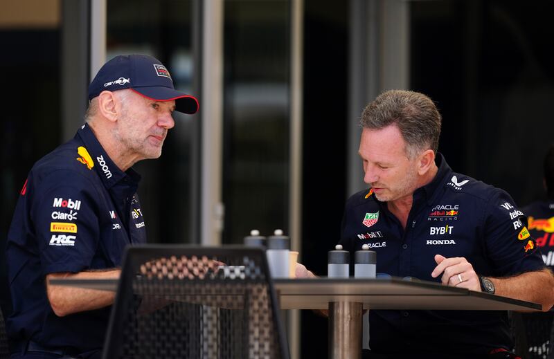 Red Bull Racing team principal Christian Horner alongside chief technical officer Adrian Newey at the Bahrain Grand Prix .