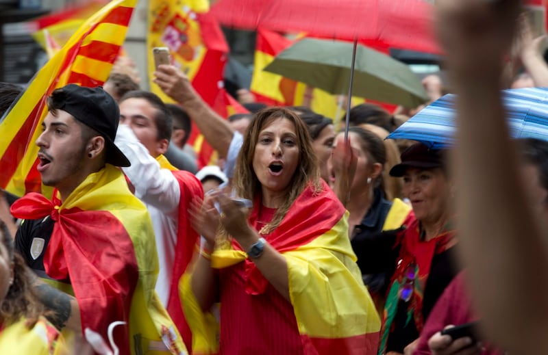 Pro-Spanish unity demonstrators march in downtown Barcelona on Sunday (Enric Marti/AP)