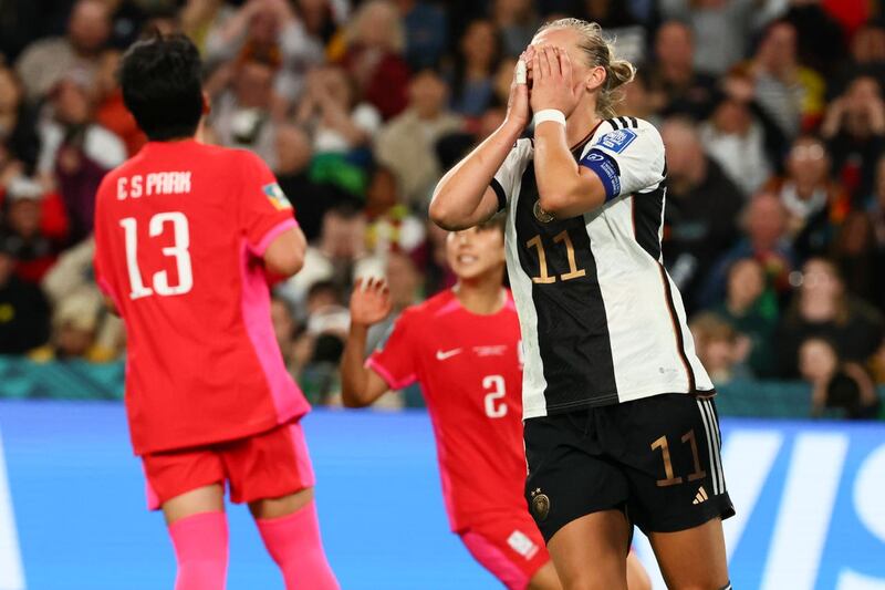 Germany’s Alexandra Popp, right, reacts after South Korea’s goalkeeper Kim Jung-mi saved her shot at goal