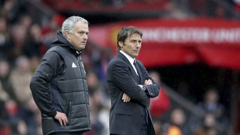Chelsea manager Antonio Conte (right) and Manchester United manager Jose Mourinho during the Premier League match at Old Trafford on Sunday 