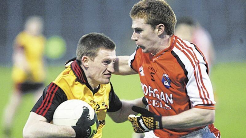 Down&#39;s Jamie O&#39; Reilly gets the ball from Armagh&#39;s Mark McConville at the Under 21 Football Championship final at Casement Park on April 15 2009. Picture by Declan Roughan 