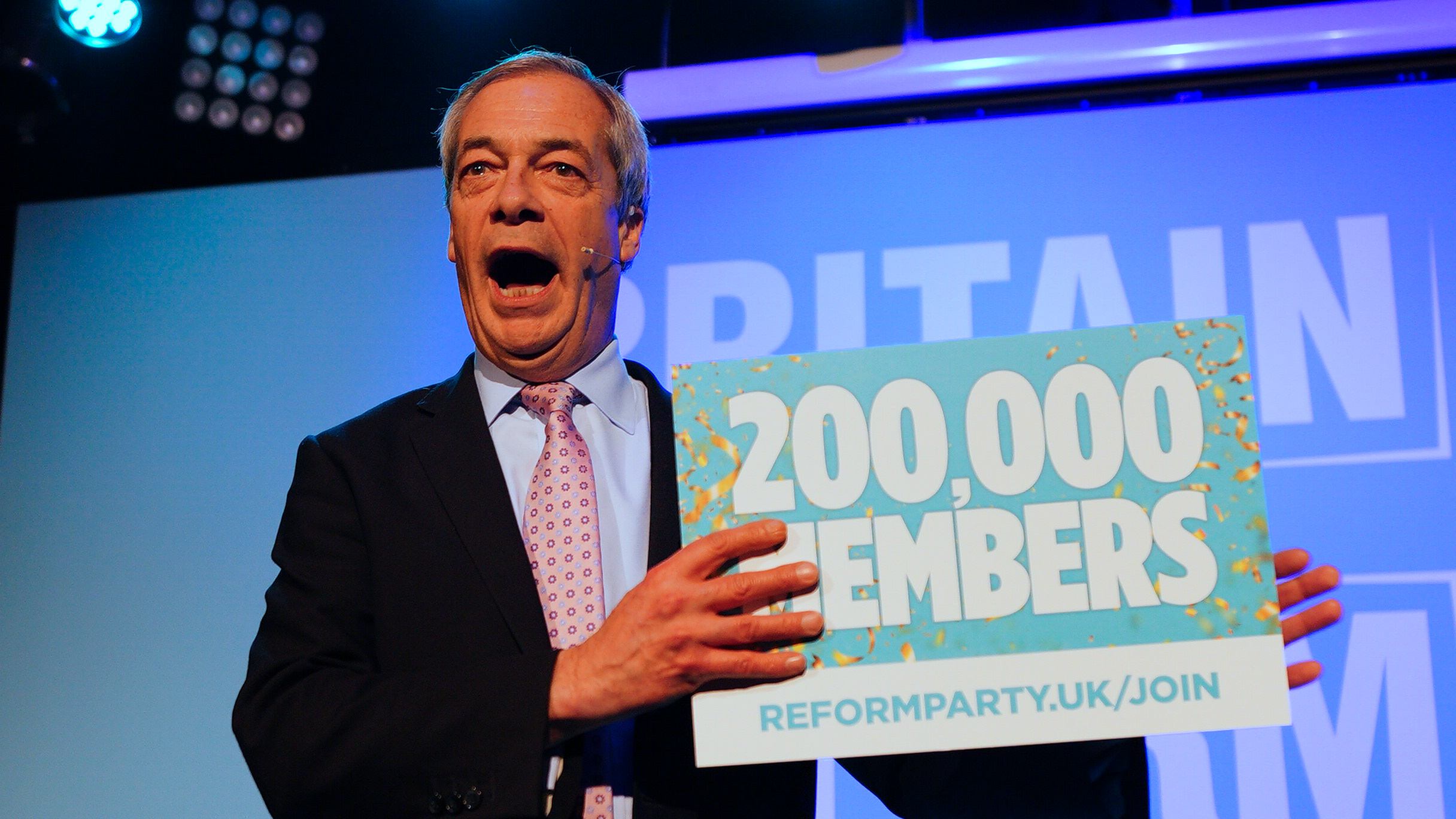Reform UK leader Nigel Farage celebrated his party’s membership numbers exceeding 200,000 at a regional conference event in WIltshire
