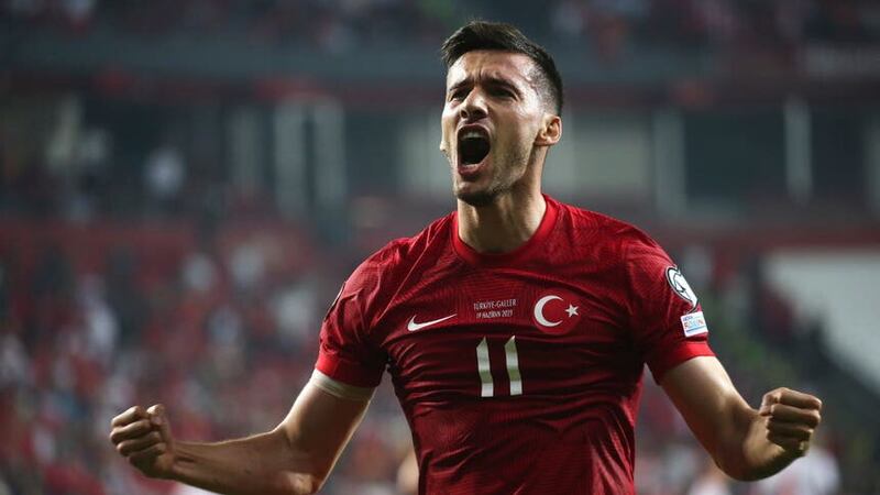 Turkey’s Umut Nayir celebrates scoring the opening goal in Turkey’s 2-0 win over Wales (Murat Akbas/Dia Images via AP)