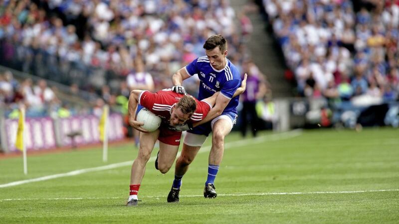 Tyrone&#39;s Kieran McGeary comes under pressure from Monaghan&#39;s Shane Carey in yesterday&#39;s semi-final game at Croke Park. Picture by Seamus Loughran 