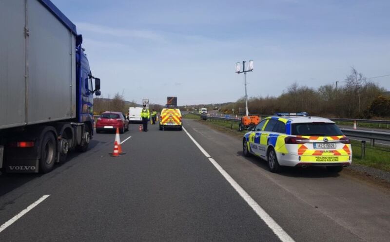 Gardai at a checkpoint on the M1 between Belfast and Dublin during phase one of coronavirus lockdown