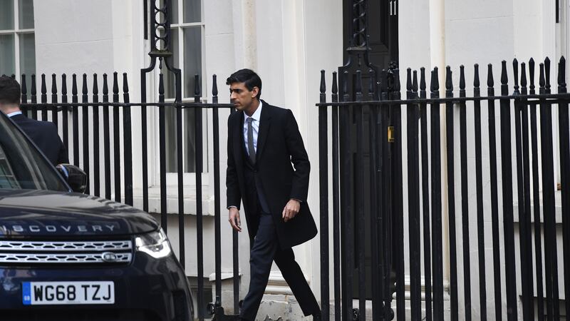 Chancellor Rishi Sunak leaves 11 Downing Street, London, the day after Prime Minister Boris Johnson put the UK in lockdown to help curb the spread of the coronavirus.