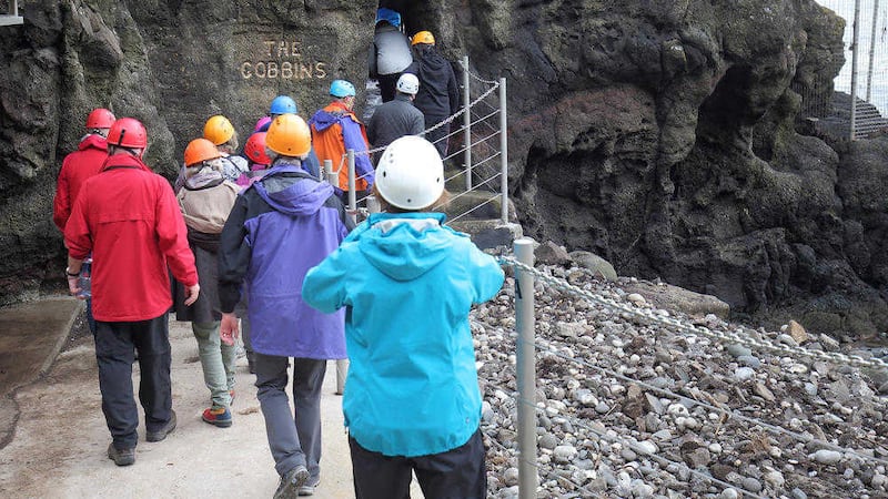 Visitors set off yesterday on the dramatic Gobbins cliff walk at Islandmagee. Picture by Cliff Donaldson 