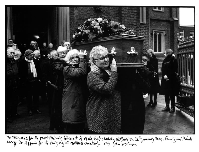 Friends and relatives carry the coffin at the funeral of poet Padraic Fiacc at St Malachy's Church, Belfast, in January this year. Picture by John Minihan