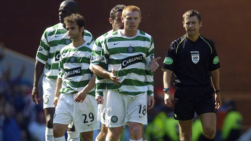 Celtic’s Neil Lennon, centre, was restrained by his team-mates after being sent off by referee Stuart Dougal in the 2005 Old Firm derby at Ibrox (Steve Welsh/PA)