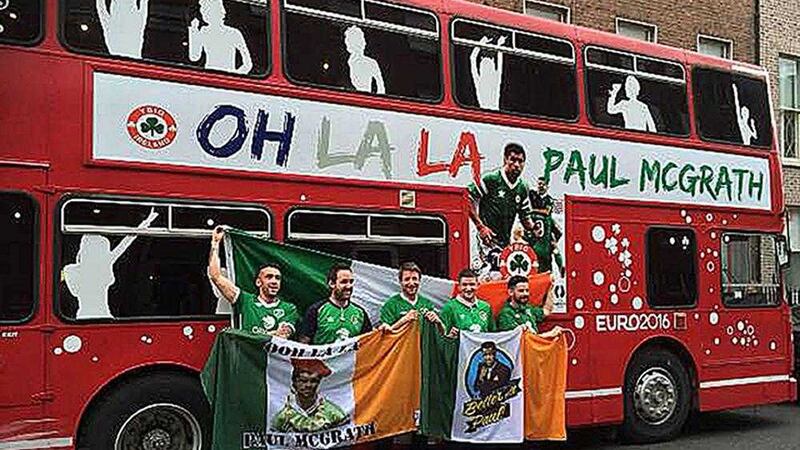 Andy Bennett from Malahide, Brian Cullen, Aidan McGuinness, Kevin Johnson and Eoin O&#39;Donoghue, all from Skerries, stand outside an old double-decker bus that they are taking on their Euro 2016 adventure PICTURE:PA 