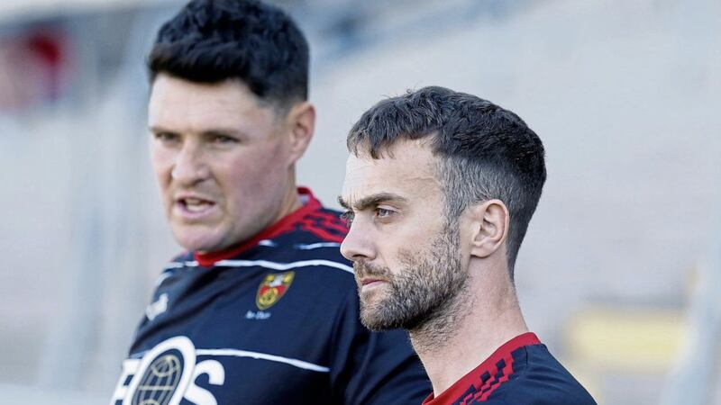 Down U20 boss Conor Laverty, pictured alongside Marty Clarke, has been touted for the senior job 