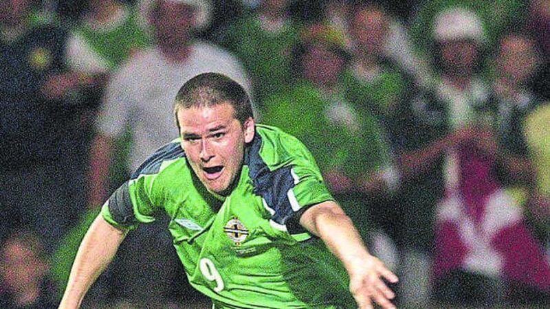 Northern Ireland's David Healy scores during the World Cup qualifier against England at Windsor Park, Belfast on Wednesday, September 7 2005<br />&nbsp;