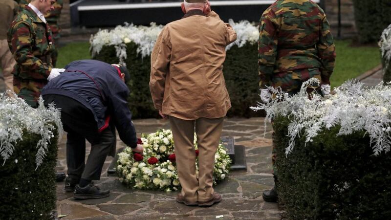 US Battle of the Bulge veterans lay floral tributes during a ceremony to commemorate the 75th anniversary of the Battle of the Bulge at the Mardasson Memorial in Bastogne, Belgium on Monday PICTURE: Francisco Seco/AP 
