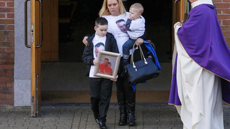 Many of Stephen Carson&#39;s family wore t-shirts bearing his image during Requiem Mass at Holy Trinity Church 