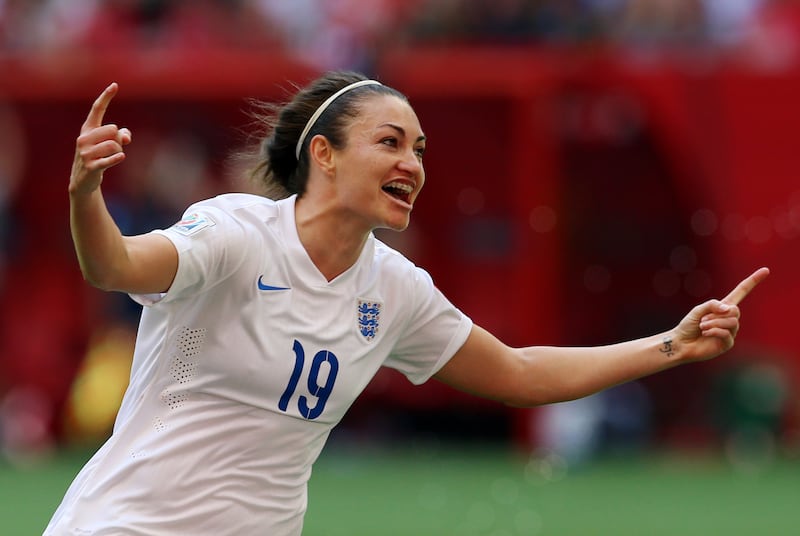 England's Jodie Taylor celebrates scoring at the 2015 World Cup